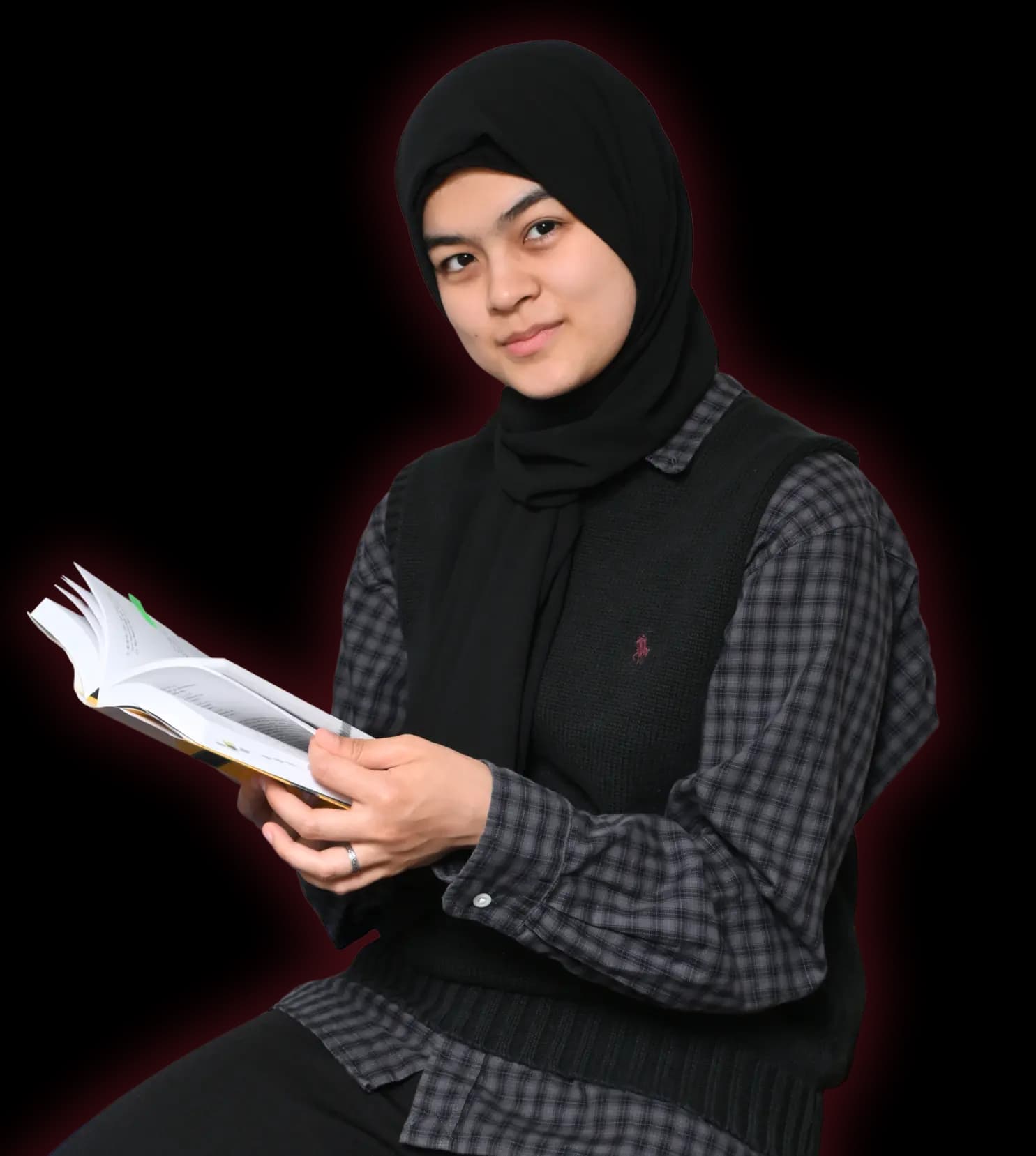 Zubiya sensei smiling and holding a book
